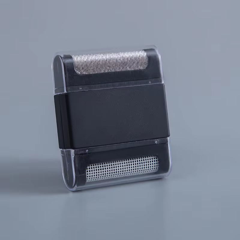 Mini-brosse antipeluche manuelle